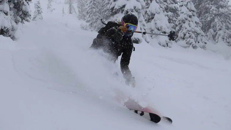 Skiier going down the slopes at Bridger Bowl in Montana
