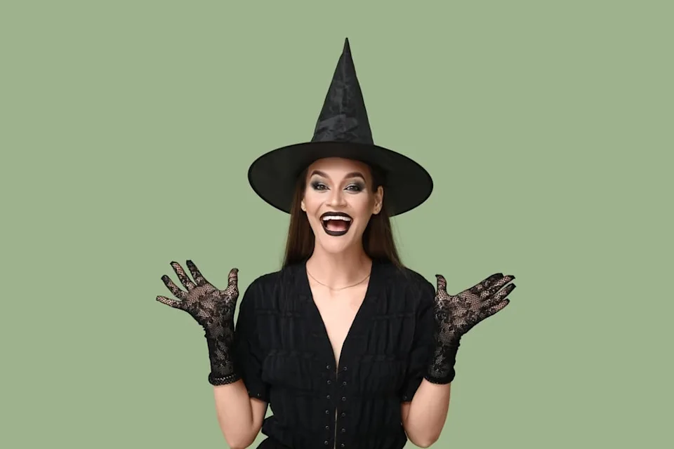 Woman dressed as a witch for Halloween.