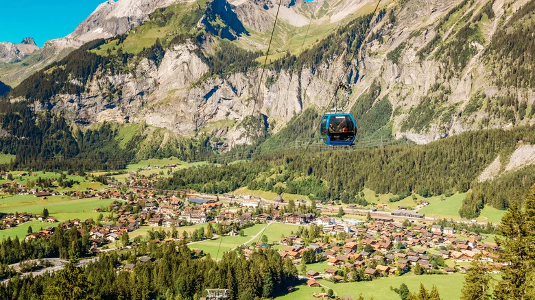 A cable car rising from Kandersteg en route to Oeschinen Lake in the Bernese Alps of Switzerland.