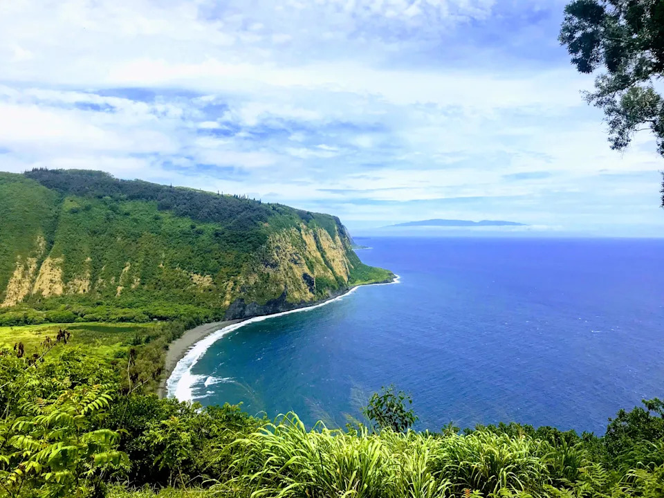 Waipi’o Valley lookout. View of cliffs and the sea. Honokaa Hawaii.