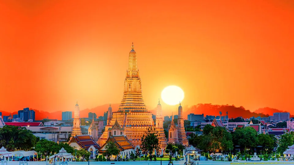 Wat Arun Temple at sunset in bangkok Thailand. Wat Arun is a Buddhist temple in Bangkok Yai district of Bangkok, Thailand, Wat Arun is among the best known of Thailand's landmarksPhotos