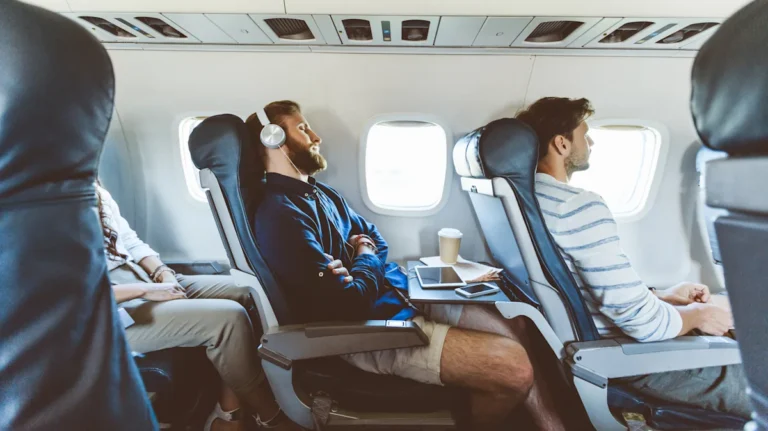 This Secret Airplane Feature Gives You More Space Sitting In A Cramped Economy Seat