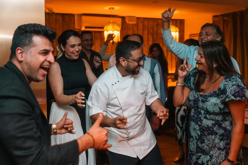 Chef Vipul, Abla Atoubi, and Chef Anand celebrating
