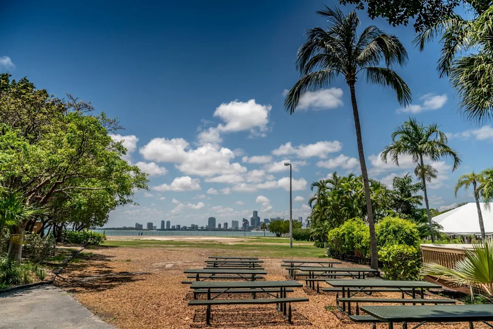Zsolt Hlinka / Getty Images Picnic tables at a campsite in Biscayne Bay.