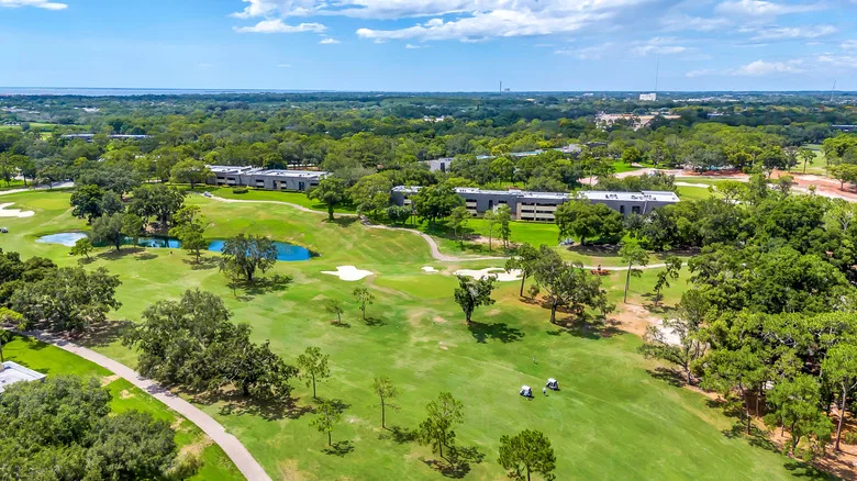 An aerial view of the fairways, greens, bunkers, and water traps at Innisbrook Golf Resort in Palm Harbor, Florida
