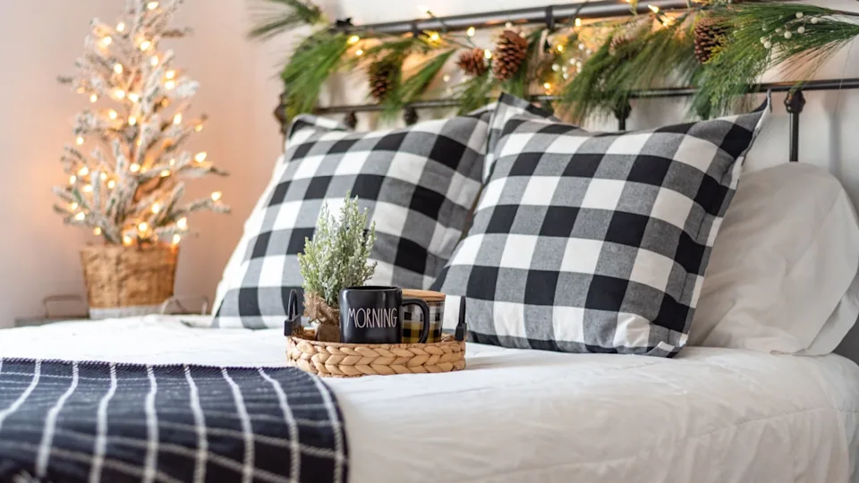 Stylish guest bedroom with coffee tray decorated for Christmas