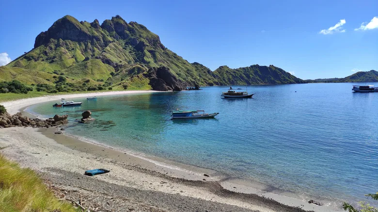 people at Padar Island relaxing and enjoying the nature