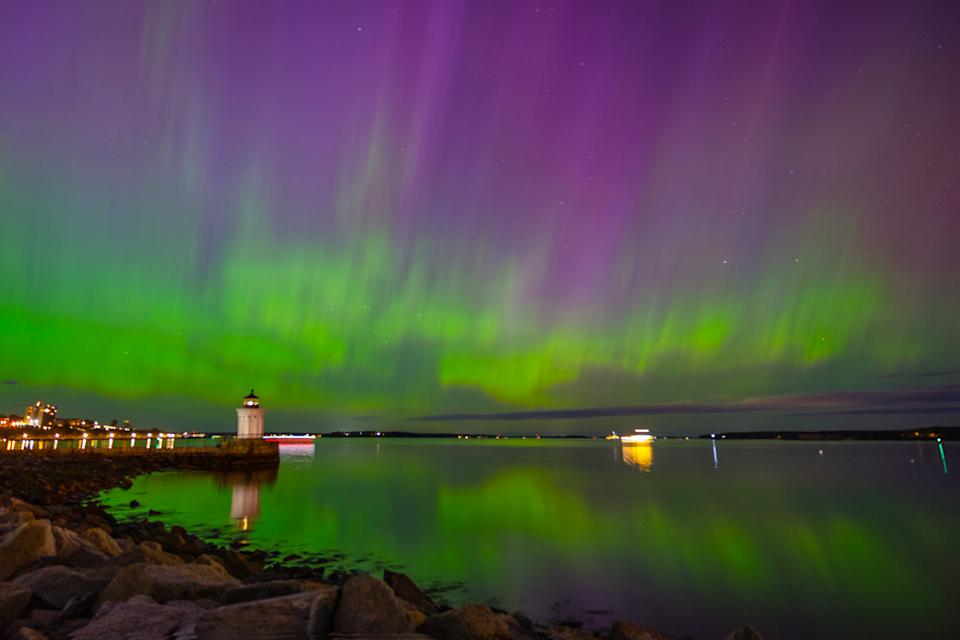 A huge solar storm brought an aurora borealis display bright enough to see with the naked eye on May 10th, 2024. It looked incredible, reflected in the waters around South Portland's tiny Bug Light lighthouse.