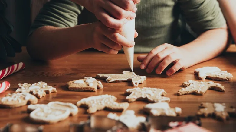 Child decorating cookies