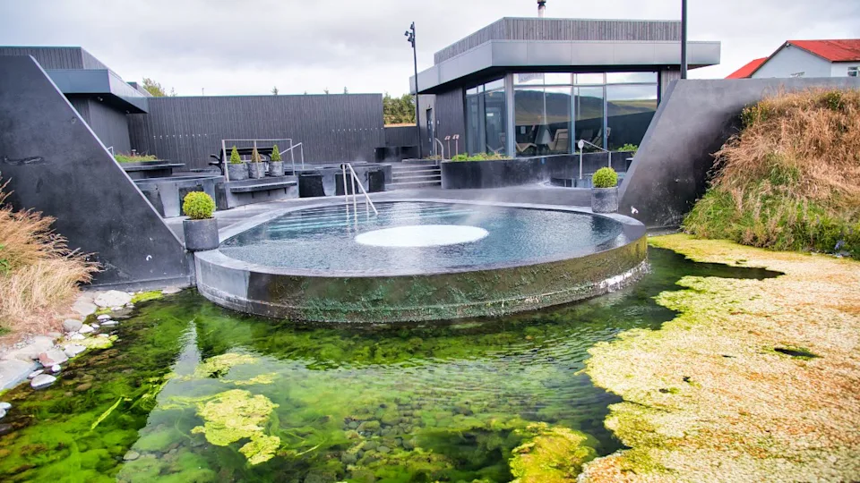 KRAUMA, ICELAND - AUGUST 10, 2019: Famous Krauna spa center in Western Iceland with thermal pools.