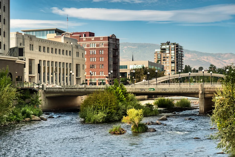 Hotels and gaming casinos downtown in the city of Reno Nevada USA. Known for its tourism industry, Reno is the county seat and most populous city of Washoe County