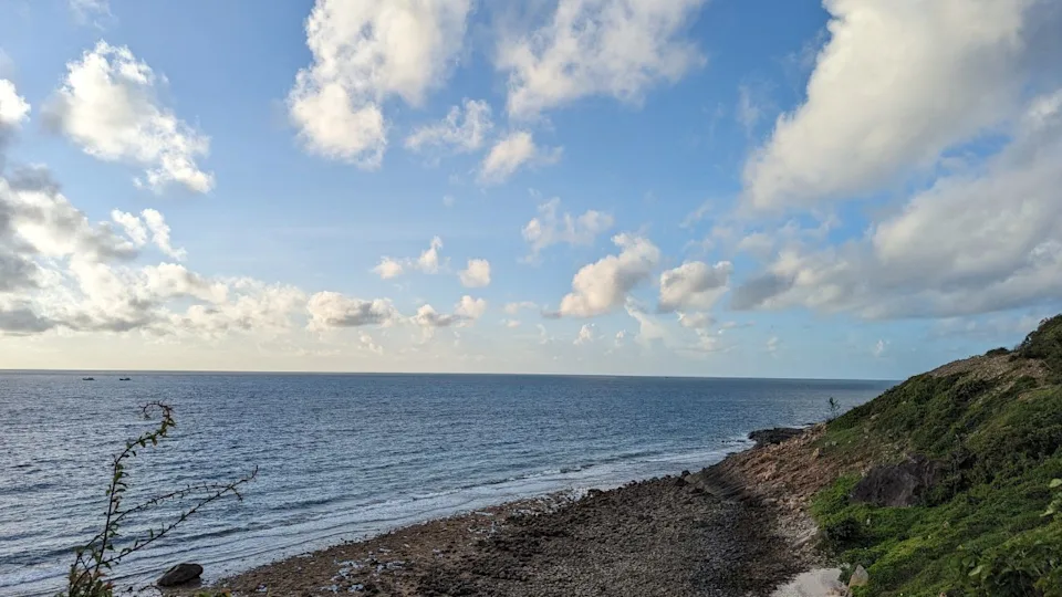 Idyllic view of rugged shore of Con Dao Island in pacific Ocean in Vietnam