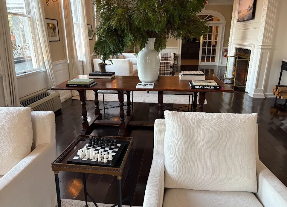 Interior of Litchfield inn with white chairs, table