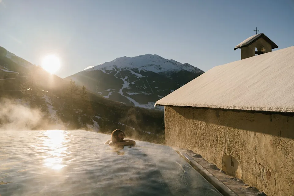 QC Spa of Wonders A guest enjoying the hot spring at QC Hotel Bagni Vecchi.