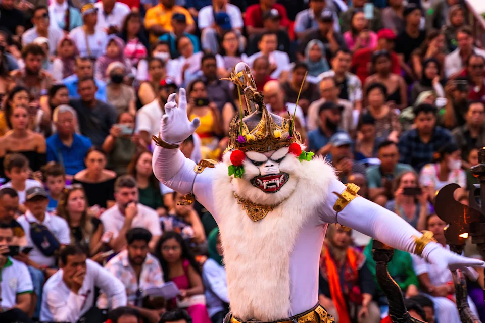 Bali, Indonesia - November 29, 2023: Hanuman's lively portrayal during Kecak in Bali, with vibrant expressions and intricate traditional attire mesmerizing onlookers