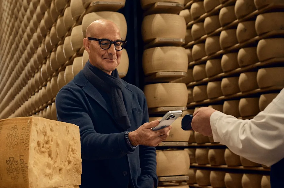 Apple Stanley using his Apple Pay to buy parmesan cheese.