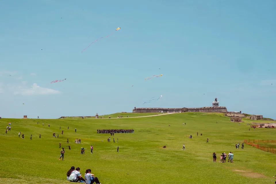 Taylor McIntyre/Travel + Leisure People enjoying a sunny day at Castillo San Felipe del Morro.