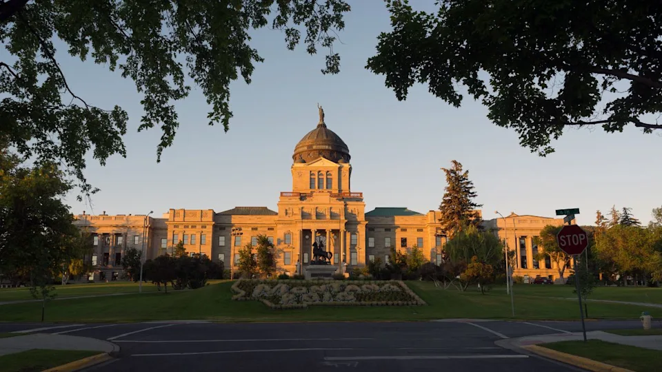 The sun hits the capital building in Helena before anyone arrives at work