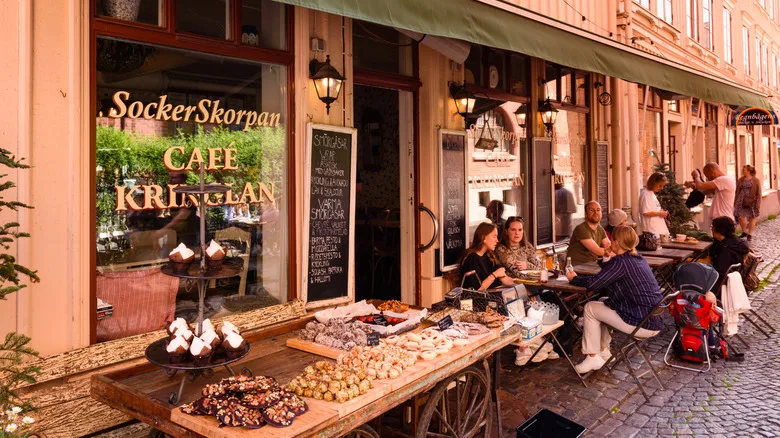 People sitting at sidewalk café in the Haga neighborhood of Gothenburg, Sweden
