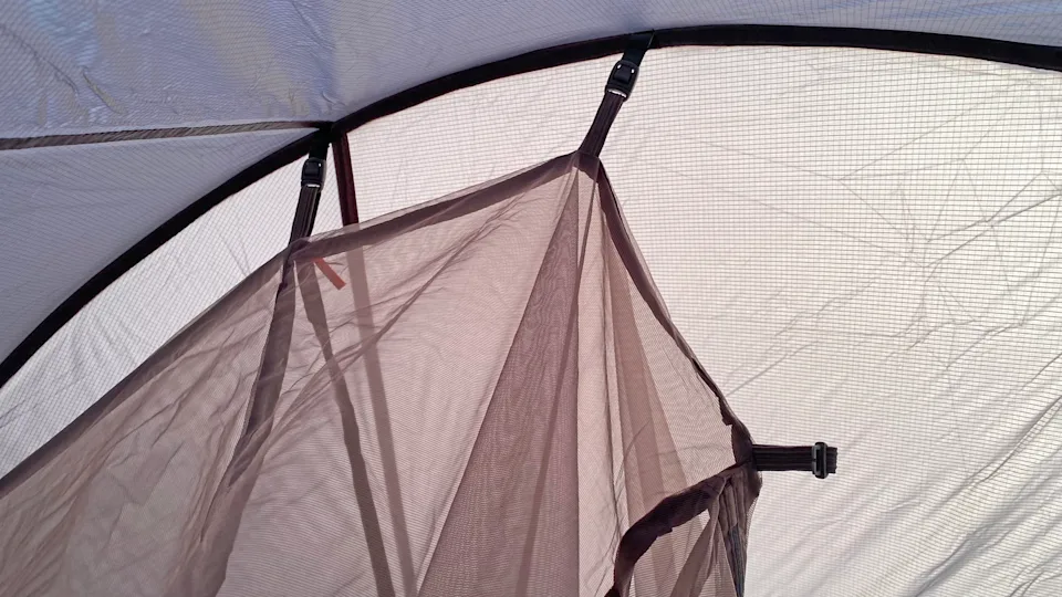 Clipping the inner tent to the pitched fly on the Solo Peak