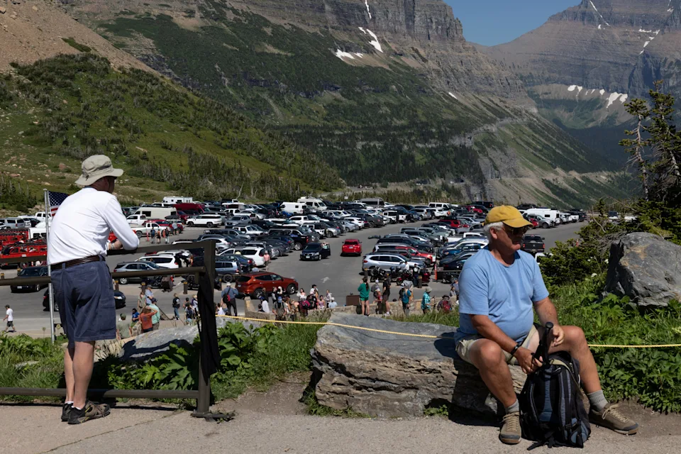 People visit the Logan Pass Visitor Center at Glacier National Park in Browning, Montana, U.S. July 8, 2025.