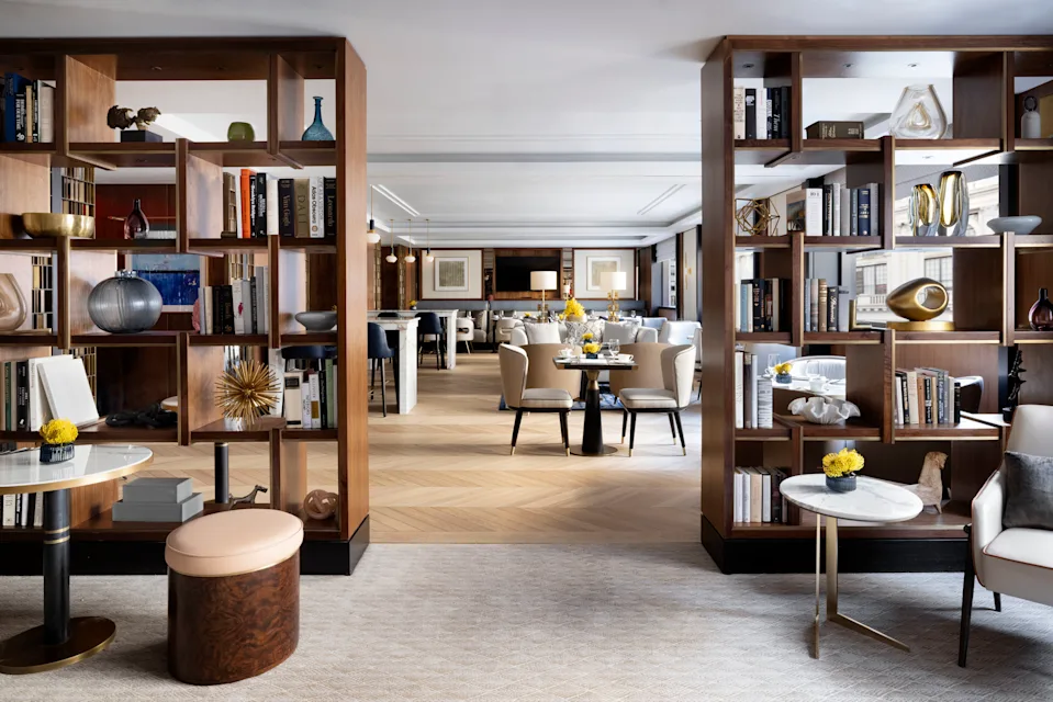 Club Lounge at The Langham, New York, showing relaxed seating areas and bright, contemporary design.