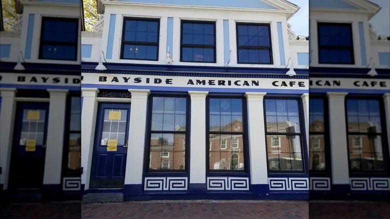 The blue and white exterior of American Bayside Cafe