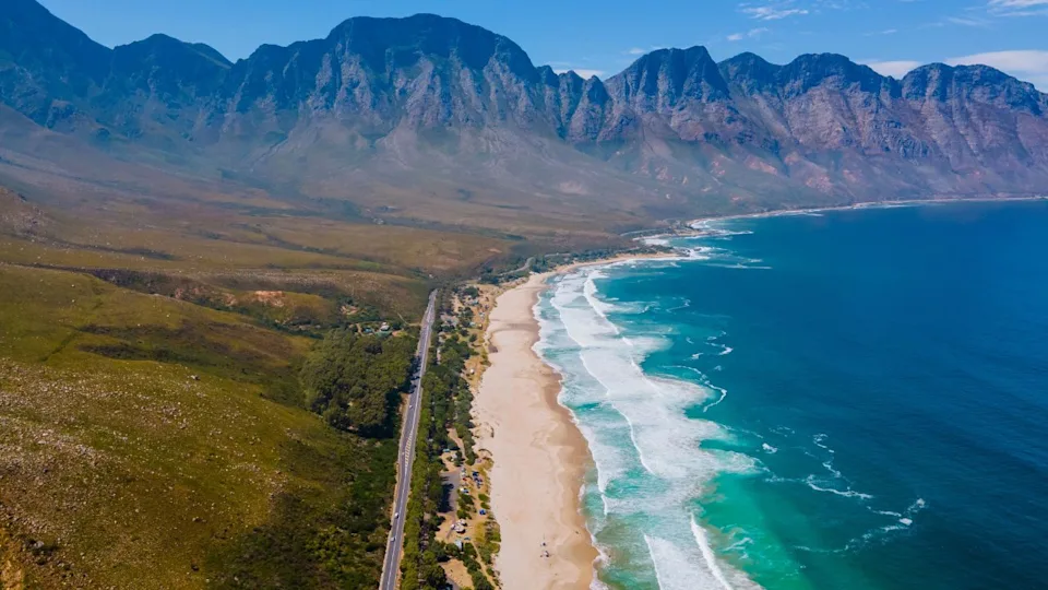 Kogelbay beach Western Cape South Africa, Kogelbay Rugged Coast Line with spectacular mountains. Garden route, drone aerial view at the road and beach
