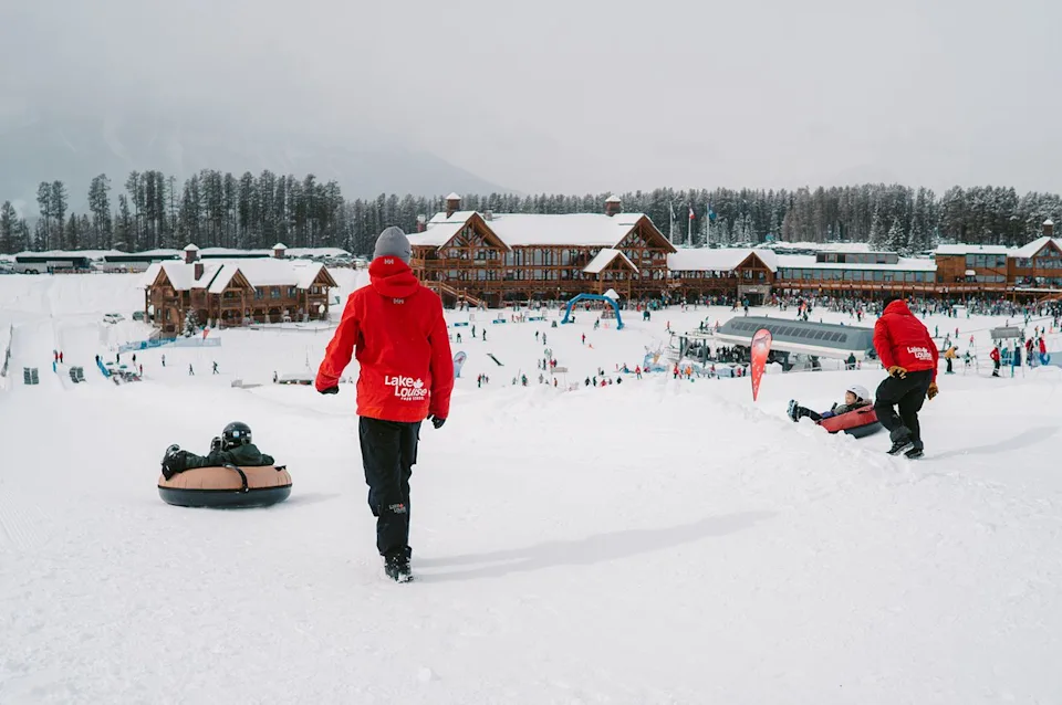 Sam Louise Visitors enjoying the snow from inner tubes.