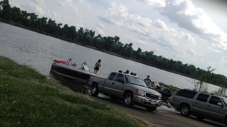 trucks at boat ramp putting boats in the water