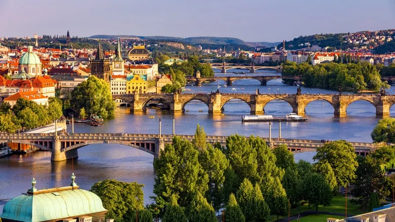Scenic view of the Old Town pier architecture and Charles Bridge over Vltava river in Prague, Czech Republic.