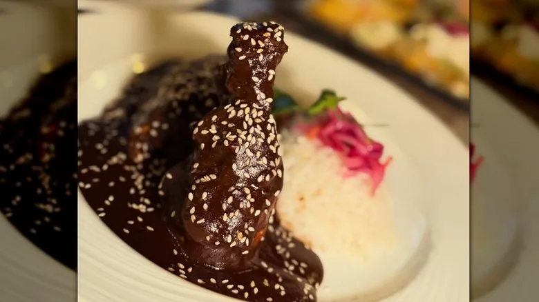 Mole poured over chicken from Cantina Los Mayas in California