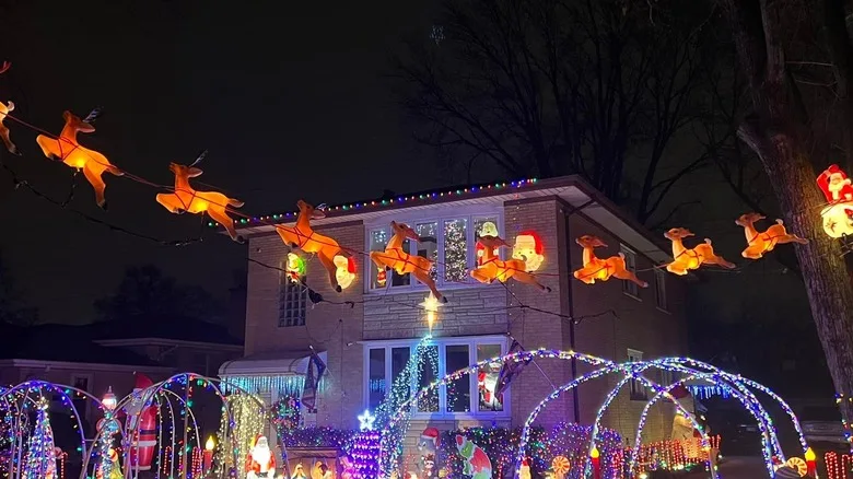 A house with Christmas decorations at night