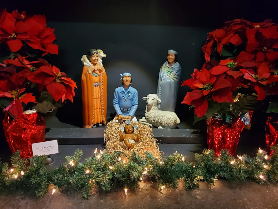 See international Christmas displays inside St. Francis Seraph Church.