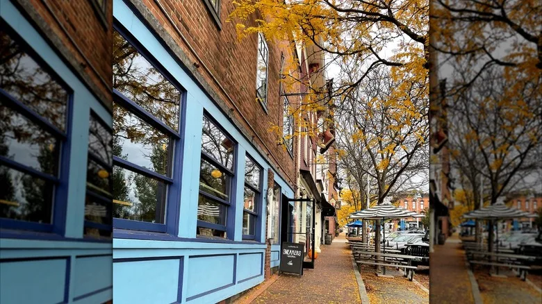 The blue painted exterior of Sneakers Bistro