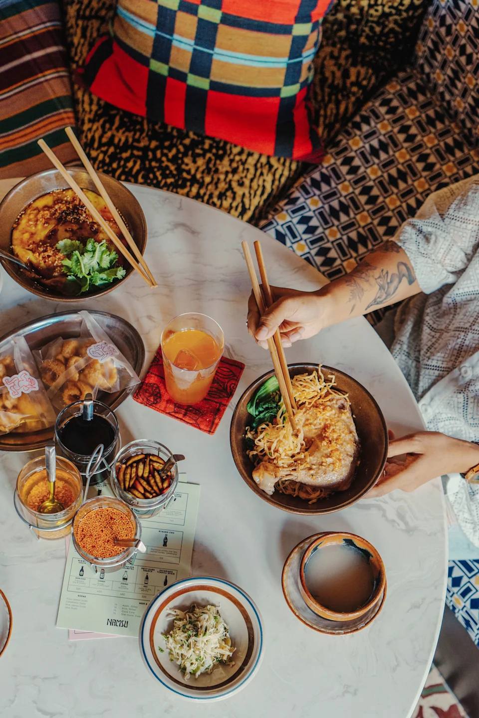 Namsu features modern takes on recipes from Myanmar's Shan State: Kachin curry clams, fermented tea-leaf salads, and chicken wings stuffed with sticky rice.