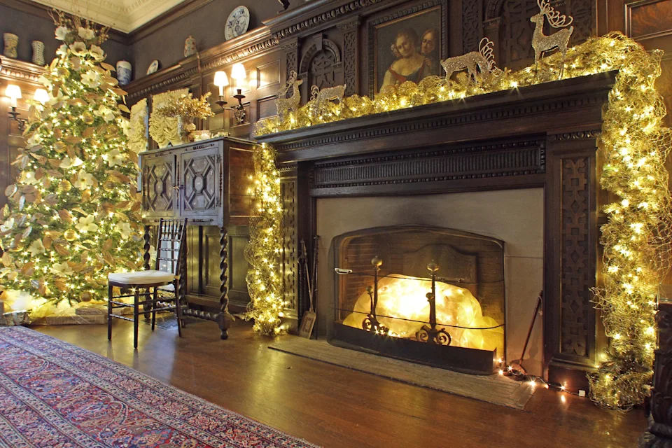 One of the main rooms at Blithewold is ablaze with Christmas decorations.