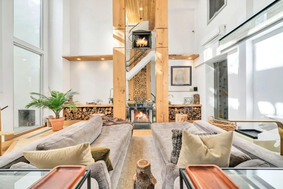 The home boasts a wood art feature for any nine of the fireplaces in the home. LuxQue Media – Mike Aghachi