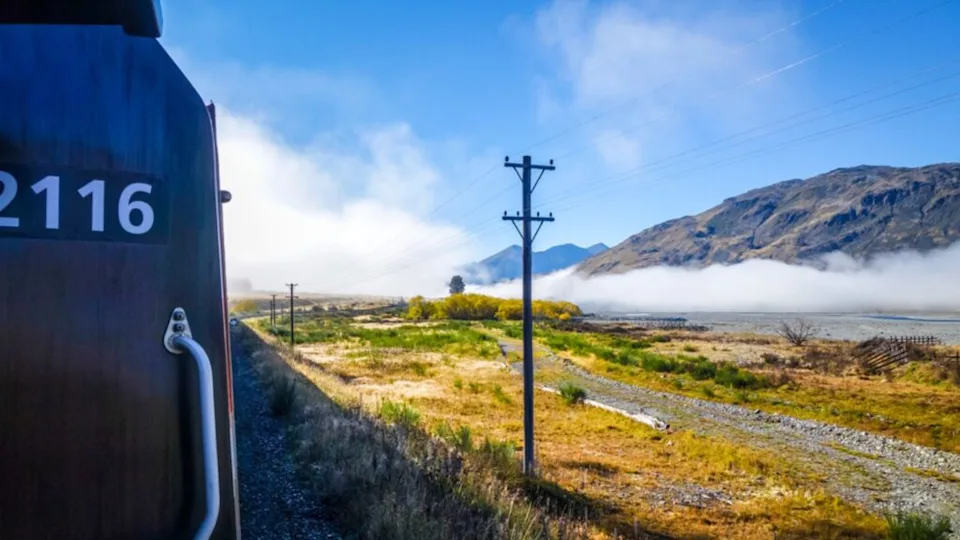 Train in Mountain fields landscape, New Zealand alps