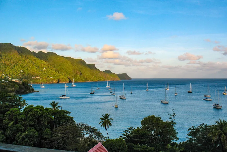 Edson Inniss / Getty Images Boats docked off the coast of Bequia.