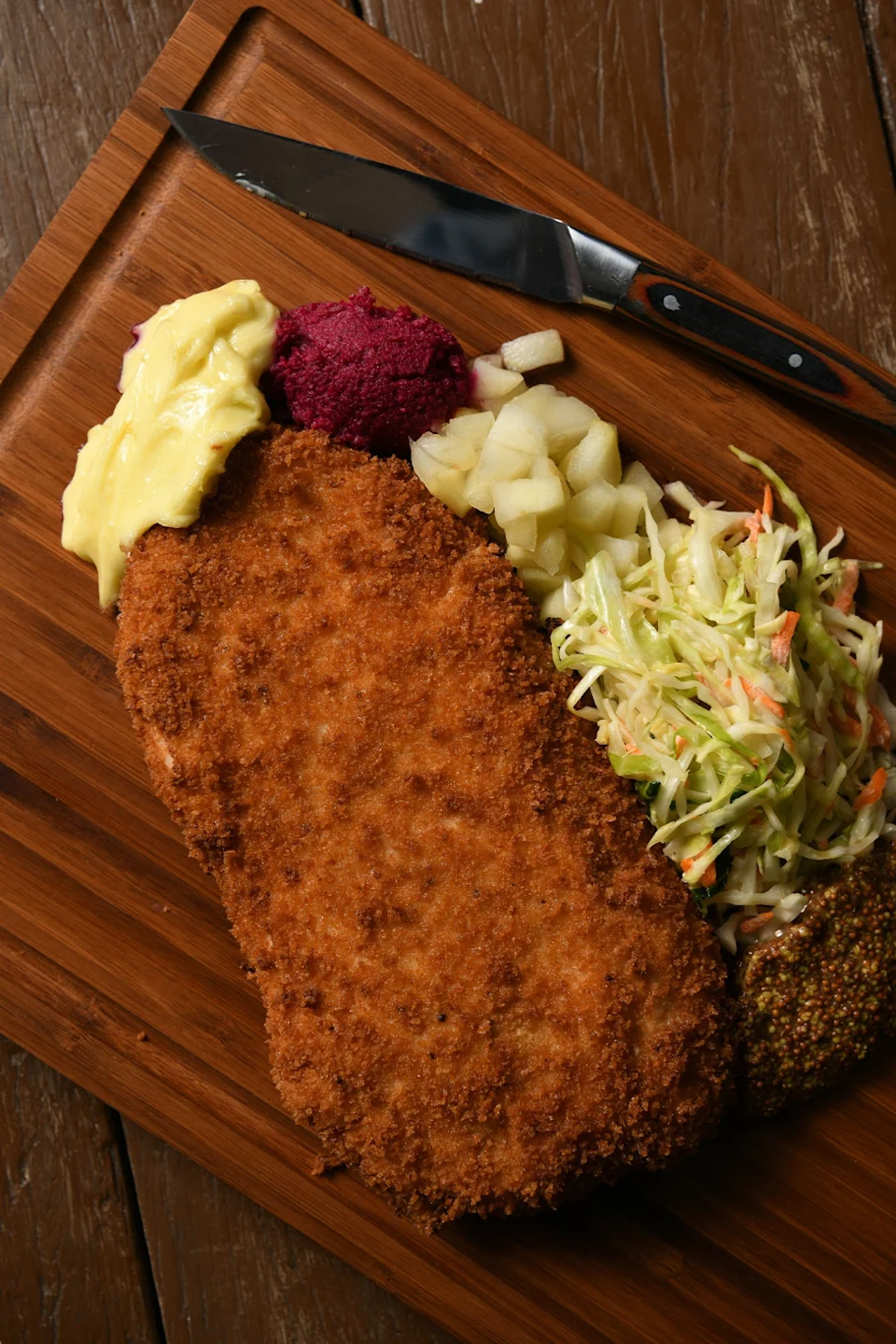 Tel Aviv transplant Malka serves dishes like a chicken schnitzel and mouth-watering lamb.