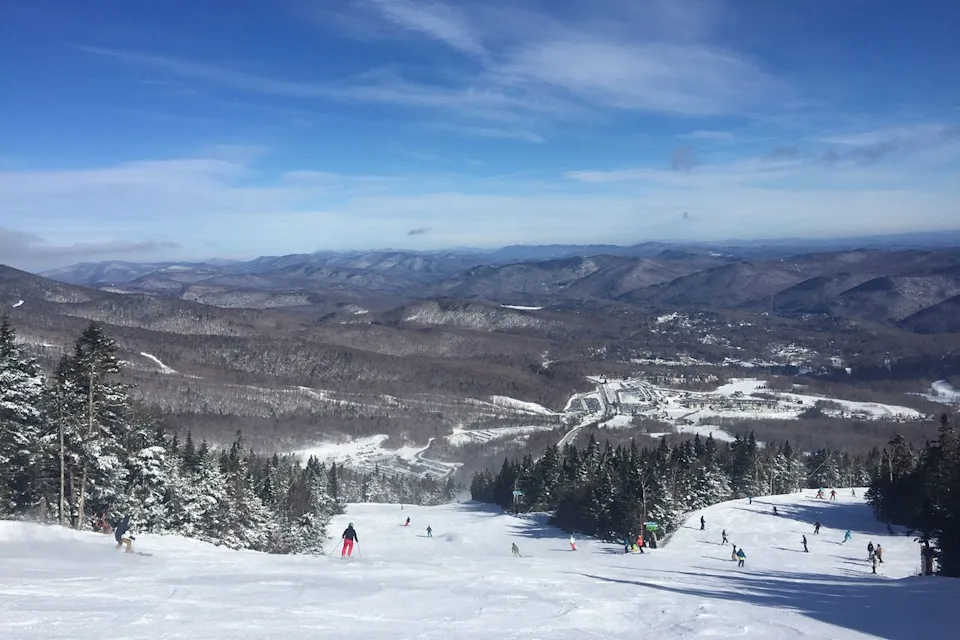 Vladimir Safko/EyeEm/Getty Images Skiers on a downhill run in Killington.