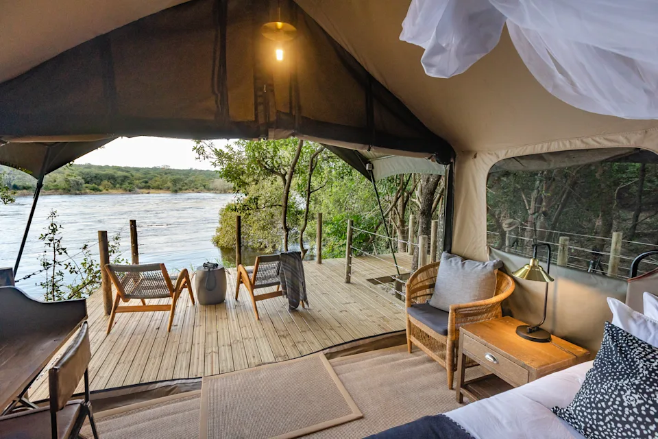 A secluded safari lodge on Tsowa Safari Island in the Zambezi River, surrounded by wilderness and river landscapes in Zambezi National Park.