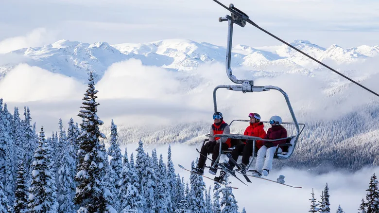 People on a ski lift in Whistler, British Columbia