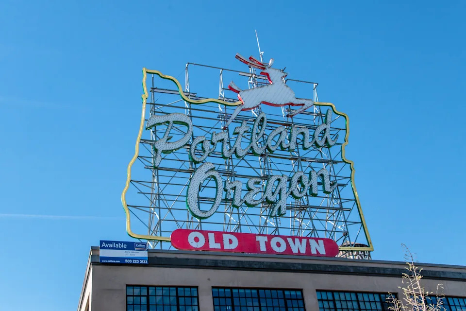 Portland, Oregon Landmark White Stag Sign With Blue Sky