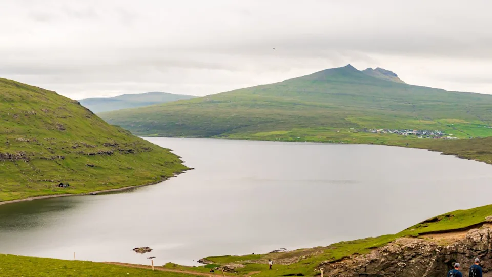 Amazing, panoramic view for Sorvagsvatn (Sørvágsvatn) lake above the ocean level and Traelanipa (Trælanípa) mountain peak, Vagar Island, Faroe Islands, Kingdom of Denmark.
