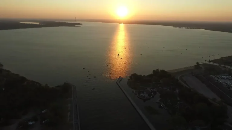 Nestled On Michigan’s Western Coast Is A Freshwater Escape With Golden Dunes And Dockside Eats