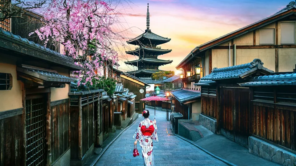 Tourist wearing japanese traditional kimono at Yasaka Pagoda in Kyoto, Japan.