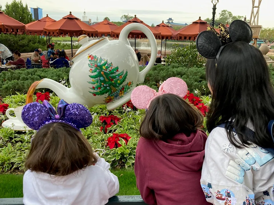 World Showcase is sprinkled with holiday displays like this larger-than-life teapot in the U.K. pavilion during EPCOT International Festival of the Holidays.