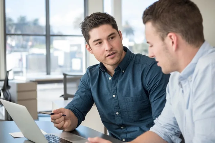 two businessmen having meeting together